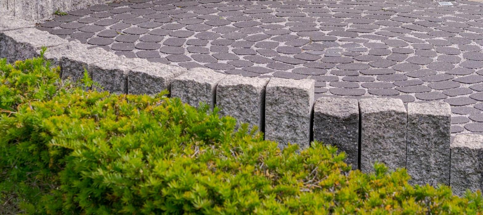 Paver patio with a stone edge